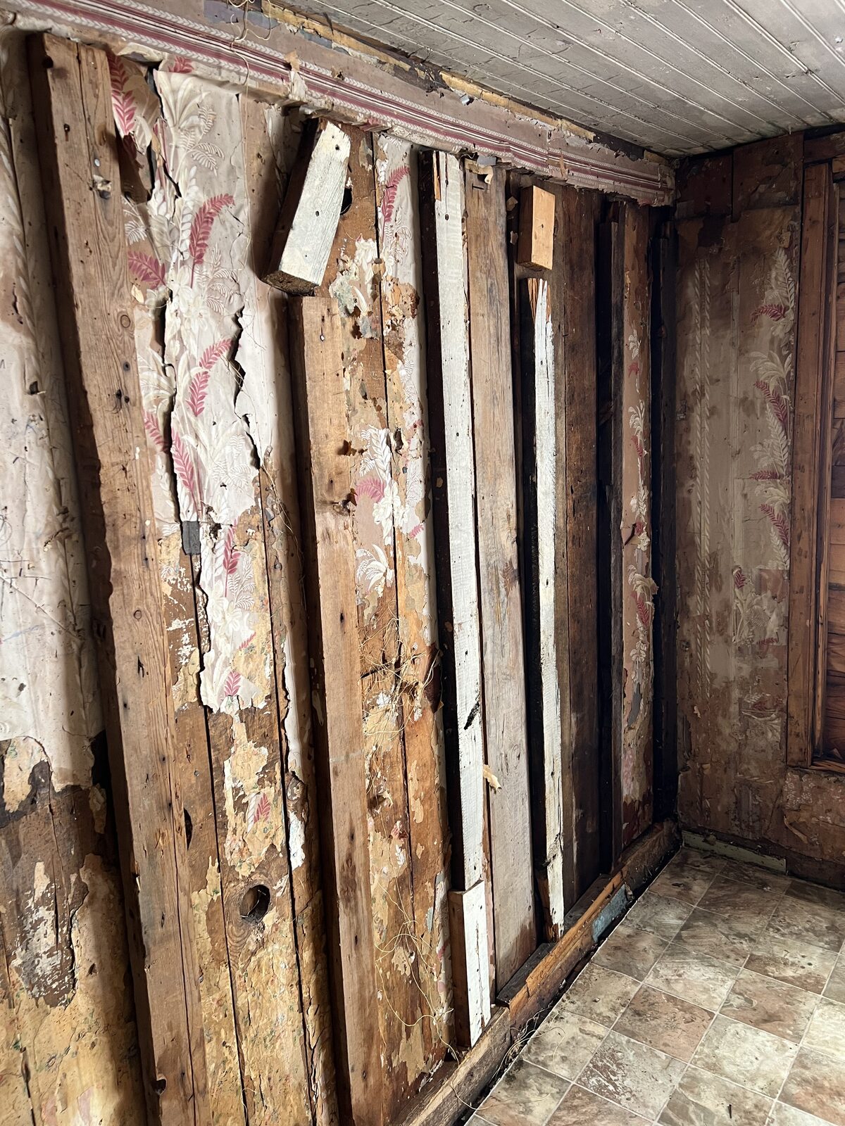 Interior of a 70-year-old building stripped to framing during asbestos abatement of walls and ceiling